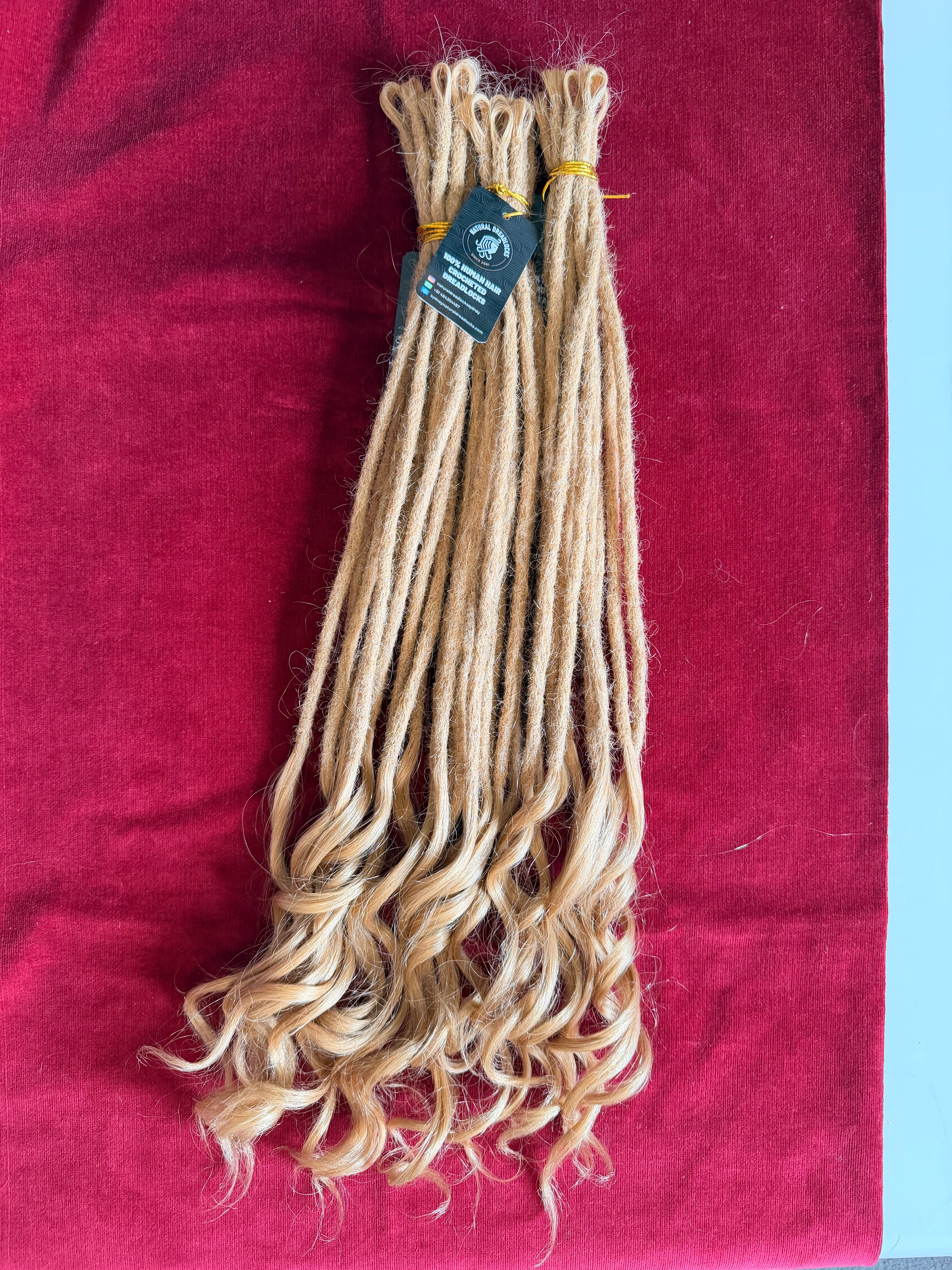 Champagne Blonde Mermaid Locs – 20” Length (7” Wavy Ends)