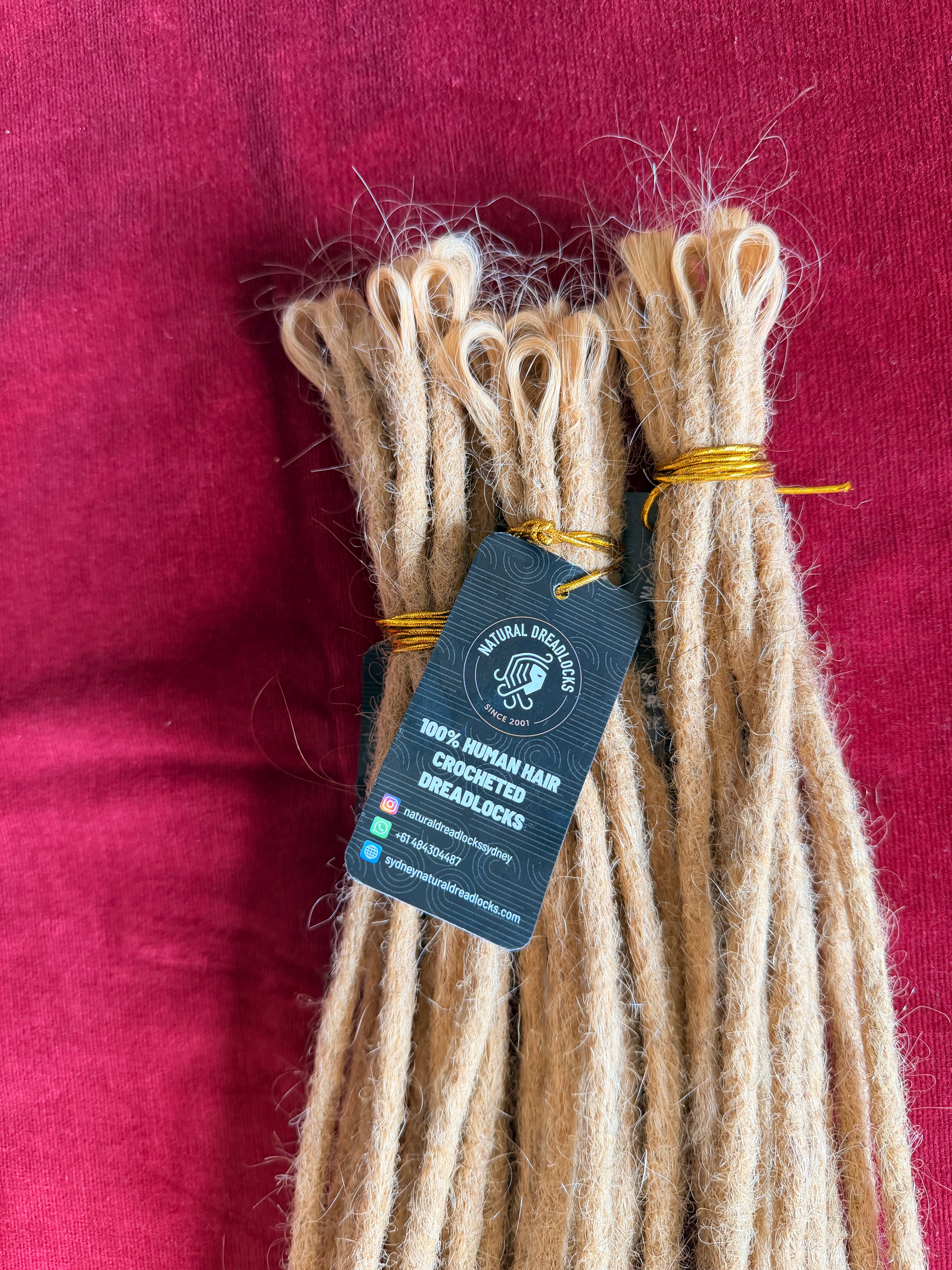 Champagne Blonde Mermaid Locs – 20” Length (7” Wavy Ends)