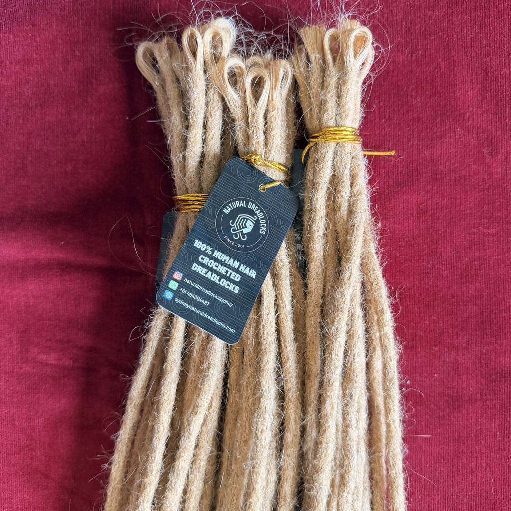 Champagne Blonde Mermaid Locs – 20” Length (7” Wavy Ends)