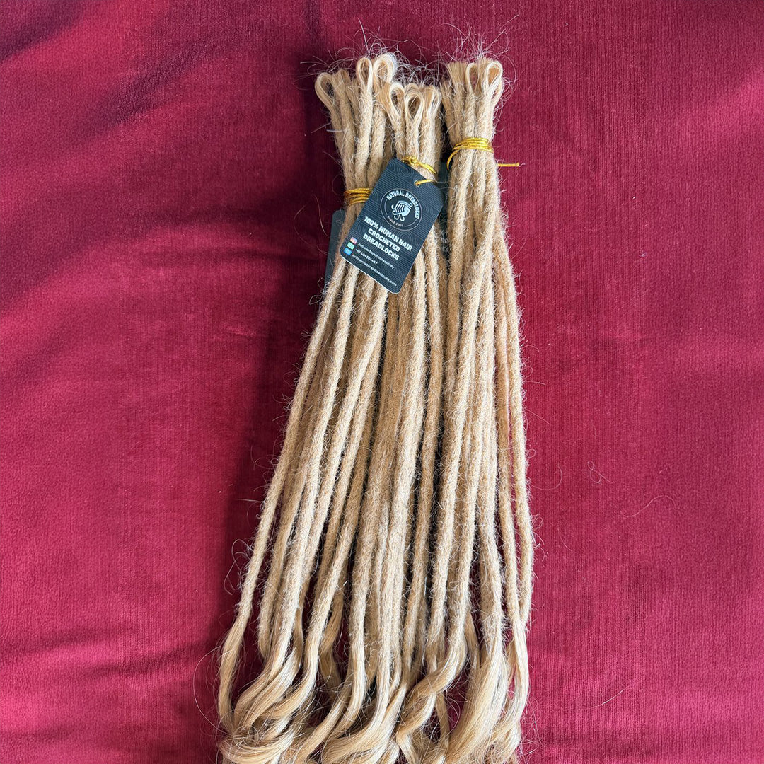 Champagne Blonde Mermaid Locs – 20” Length (7” Wavy Ends)